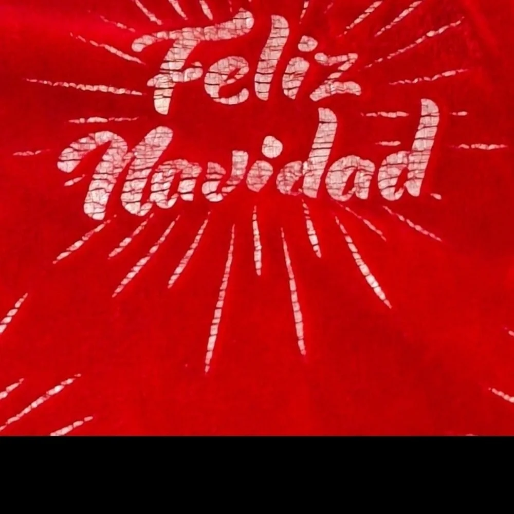 FELIZ NAVI DA Christmas throw